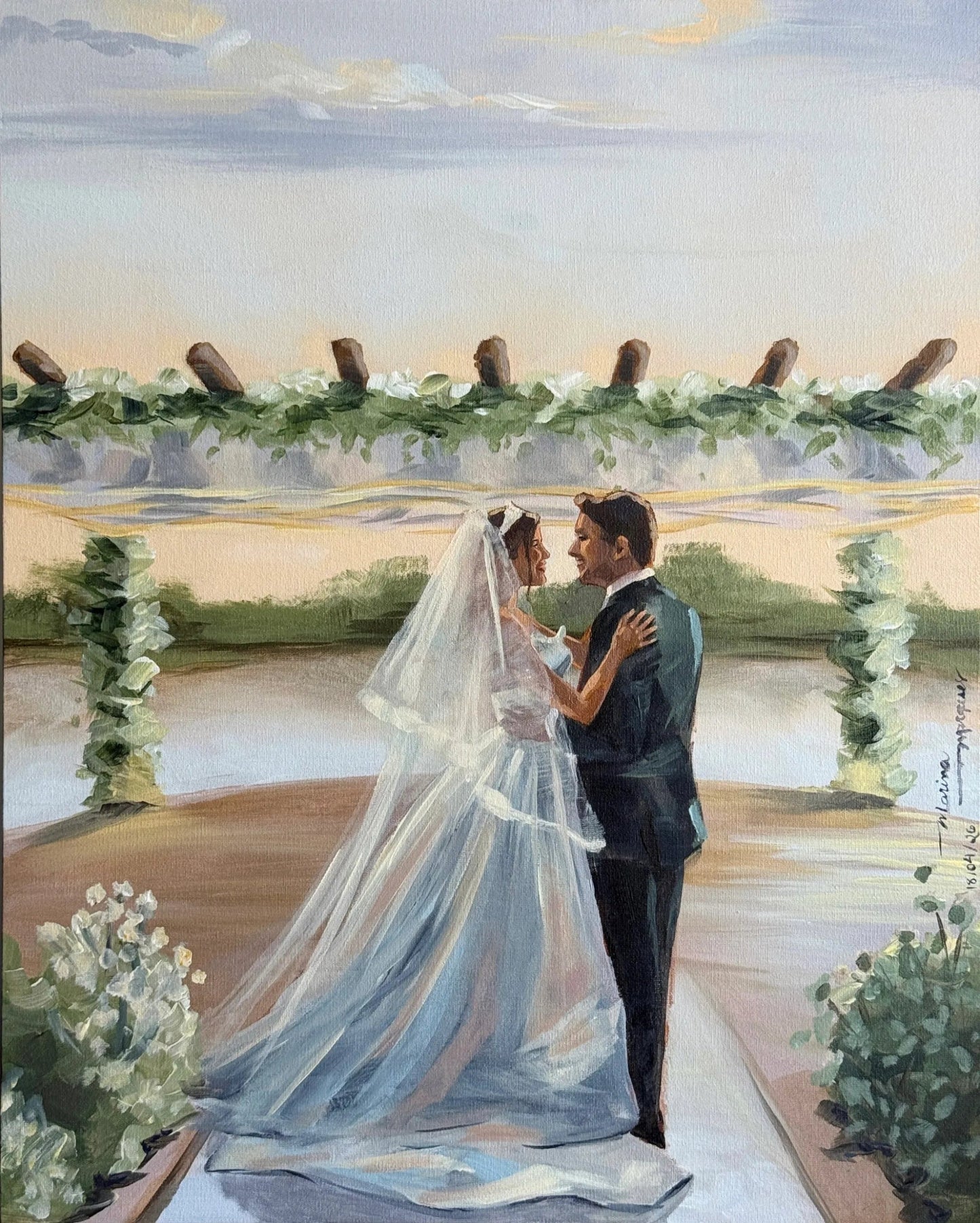 Pintura dos noivos se abraçando com o por do sol ao fundo.
